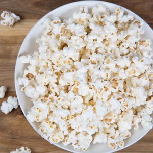 Fresh homemade popcorn in a white bowl