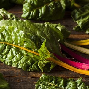 Raw Organic Rainbow Swiss Chard on a Background