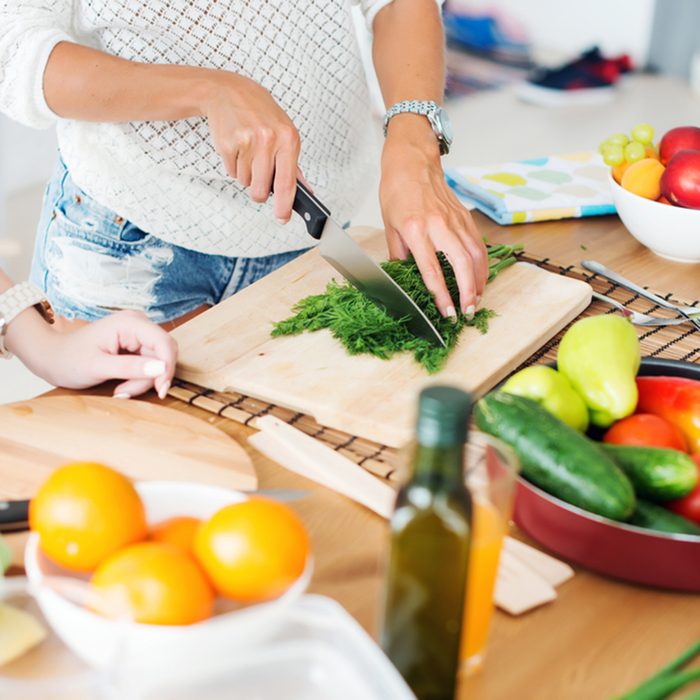 Gorgeous young Women preparing dinner in a kitchen concept cooking, culinary, healthy lifestyle; Shutterstock ID 307780538