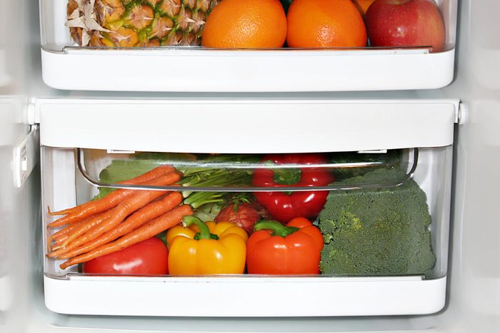Fresh fruit and vegetables in a crisper drawer