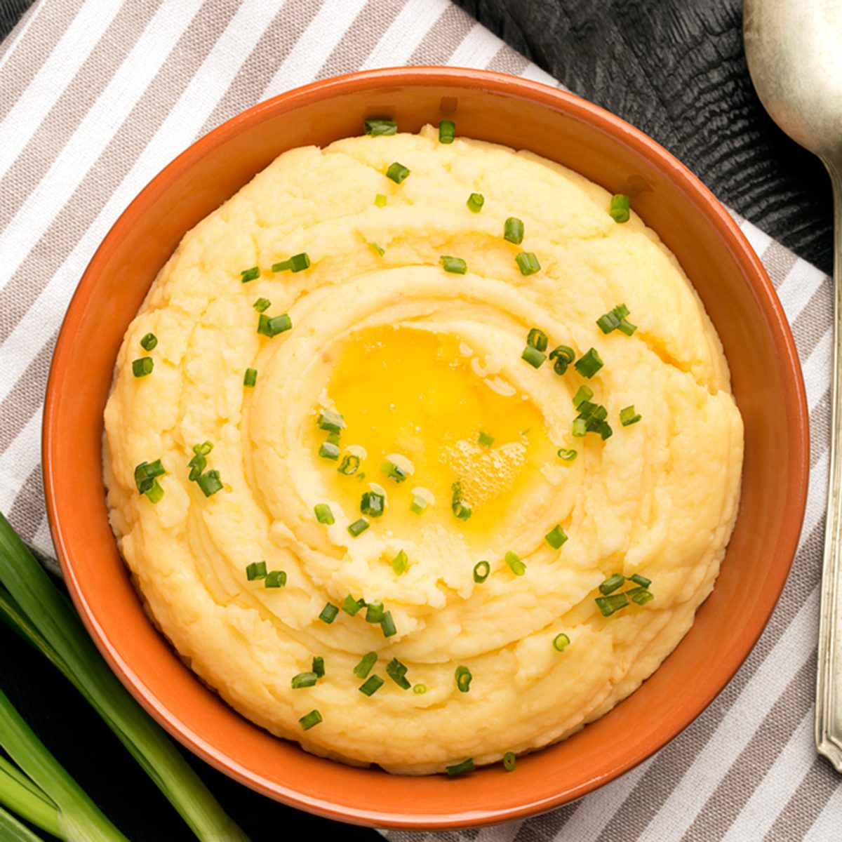 Irish mashed potatoes (Champ) with butter and chives; Shutterstock ID 412038115
