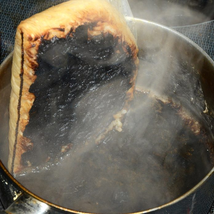 A smoking, burnt pot of boil-in-bag rice.