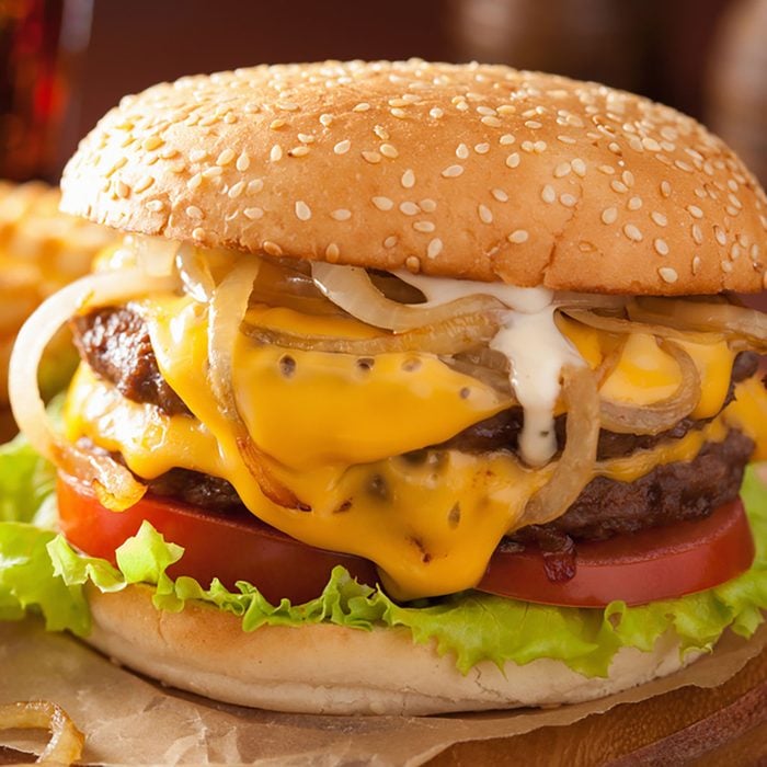 double cheeseburger with tomato and onion