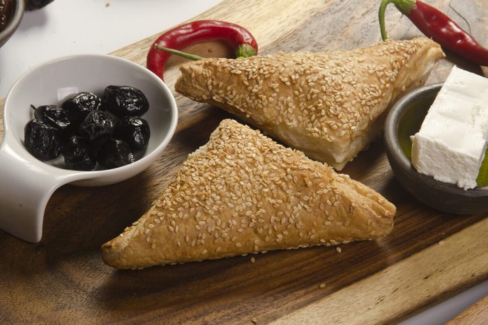 Borek (Also Burek) a Turkish pastry filled with cheese or potato or mushroom with black olives