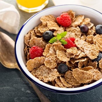 Multigrain wholewheat healthy cereals with fresh berry for breakfast