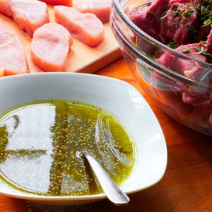 meat with marinade and herbs
