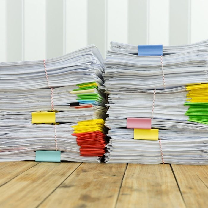 Paperwork pile messy of business financial put on desk.; Shutterstock ID 780809596; Job (TFH, TOH, RD, BNB, CWM, CM): Taste of Home