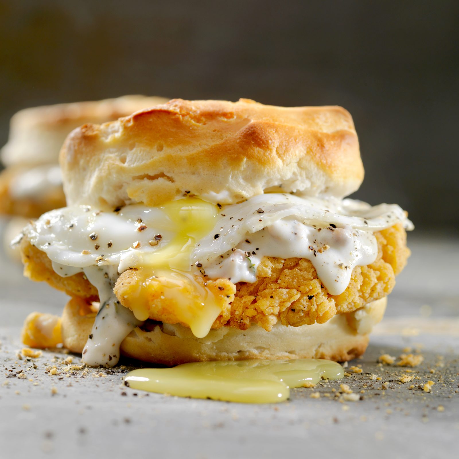 Fried Chicken Sandwich with a Fried Egg,Sausage Gravy on a Biscuit