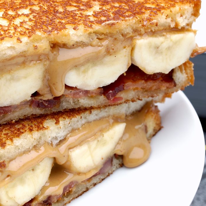 close up of a peanut butter, banana and bacon sandwich
