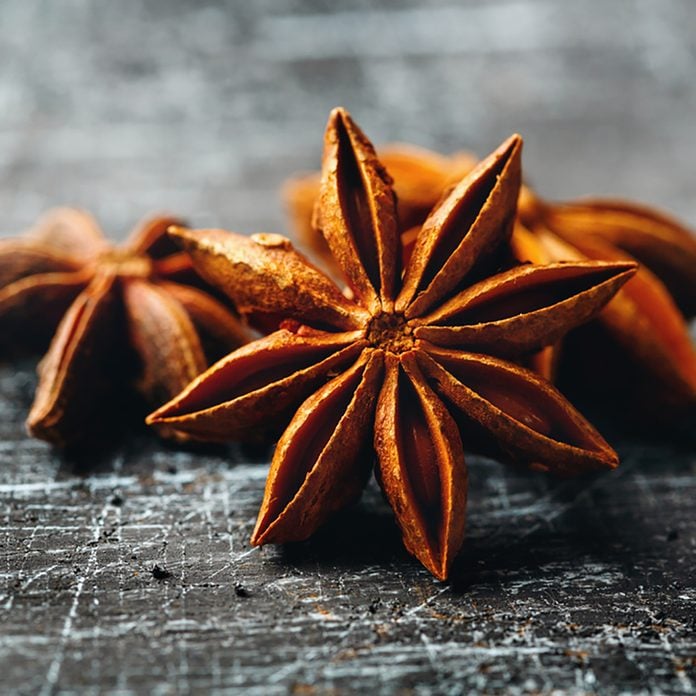 Food Background with Close-up of Star Anise on Vintage Black Table. Selective Focus. ; Shutterstock ID 396111676; Job (TFH, TOH, RD, BNB, CWM, CM): Taste of Home