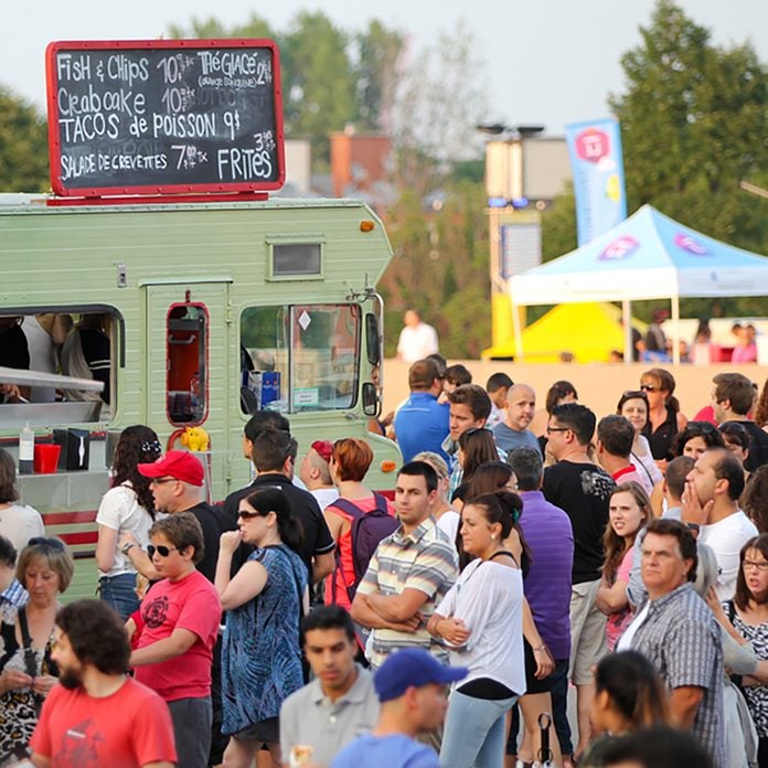 MONTREAL, CANADA - AUGUST 01: More than 40 food trucks on the esplanade Financiere Sun Life for the event first friday of the month on august 01 in Montreal, Canada. ; Shutterstock ID 208819690