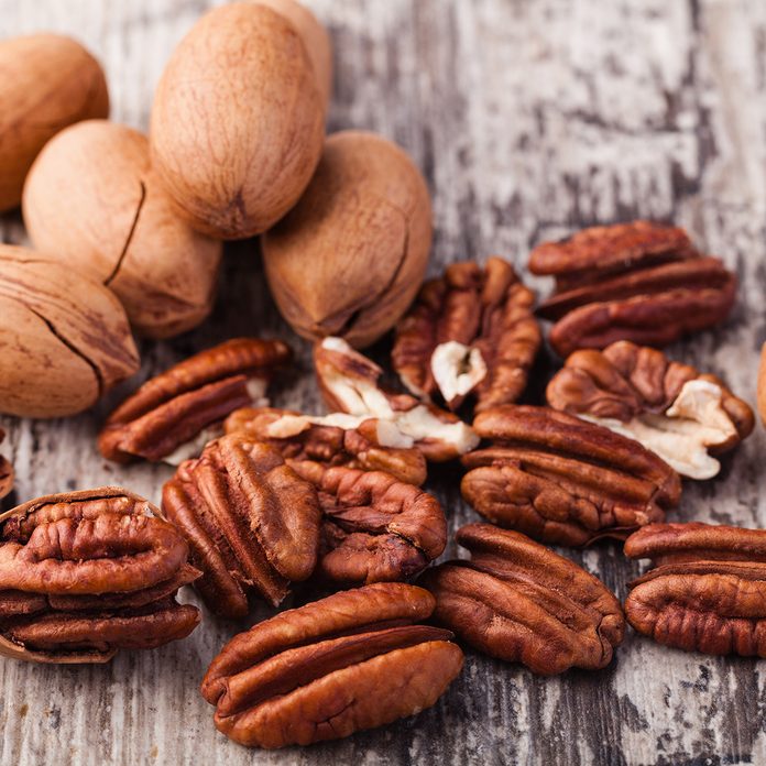 Pecan nuts on a wooden table