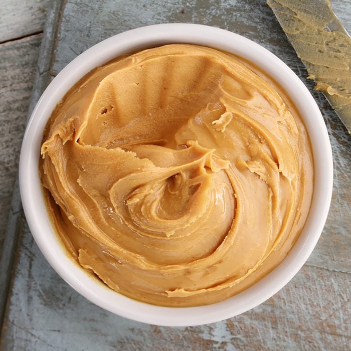 smooth peanut butter in dish.