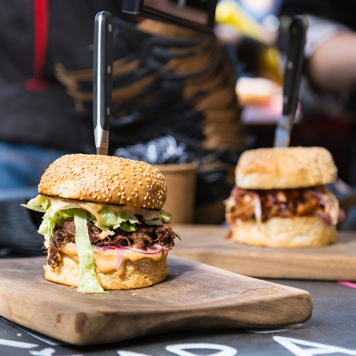 Burgers artfully presented on boards