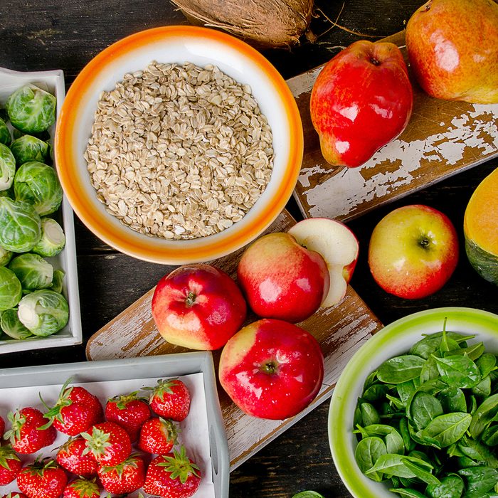 high fiber foods like apples, strawberries, oatmeal, pears, spinach and Brussels sprouts
