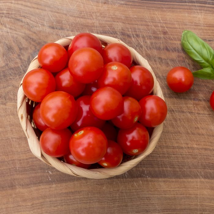 wicker basket of cherry tomatoes