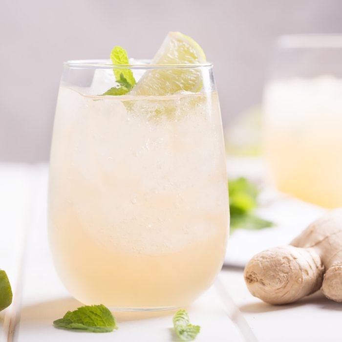 Fresh cocktail prepared with ginger beer, lime and ice. Beverage on the table. Image contains copy space for text; Shutterstock ID 771991972; Job (TFH, TOH, RD, BNB, CWM, CM): TOH