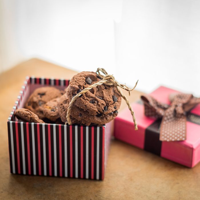 Chocolate cookies and Gift box on wood table