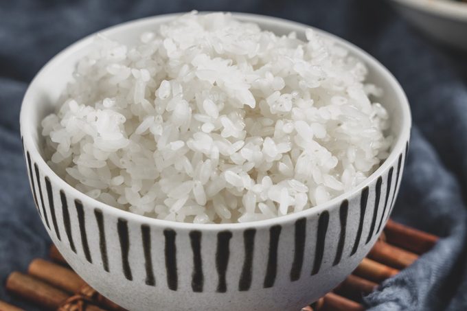 A bowl of cooked jasmine rice.