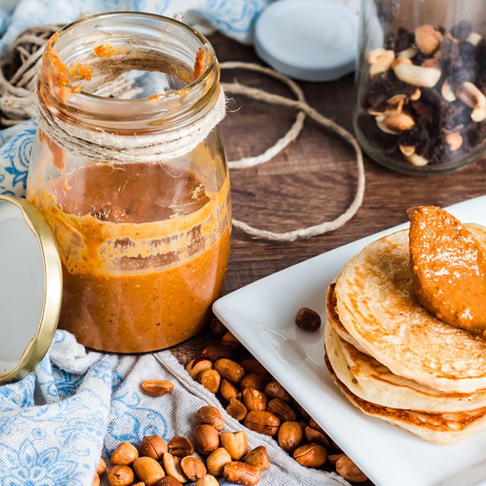 peanut butter in a jar, eat a teaspoon, fresh peanuts and pancakes; Shutterstock ID 252419200; Job (TFH, TOH, RD, BNB, CWM, CM): Taste of Home