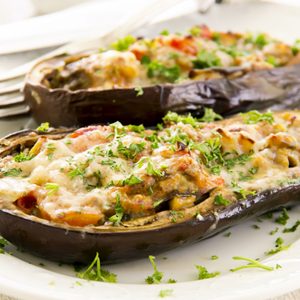 aubergine stuffed with vegetables and cheese; Shutterstock ID 116901592; 