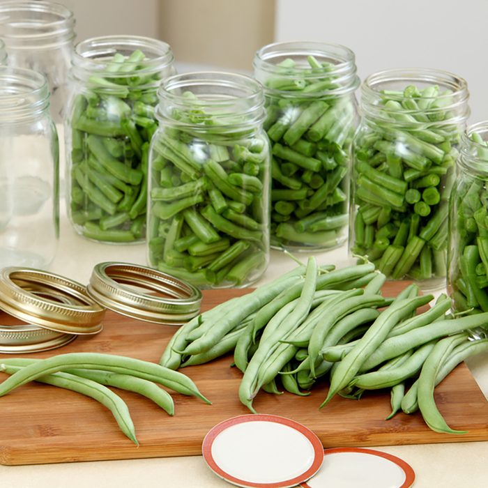 Green beans in a traditional process of canning and preserving at home