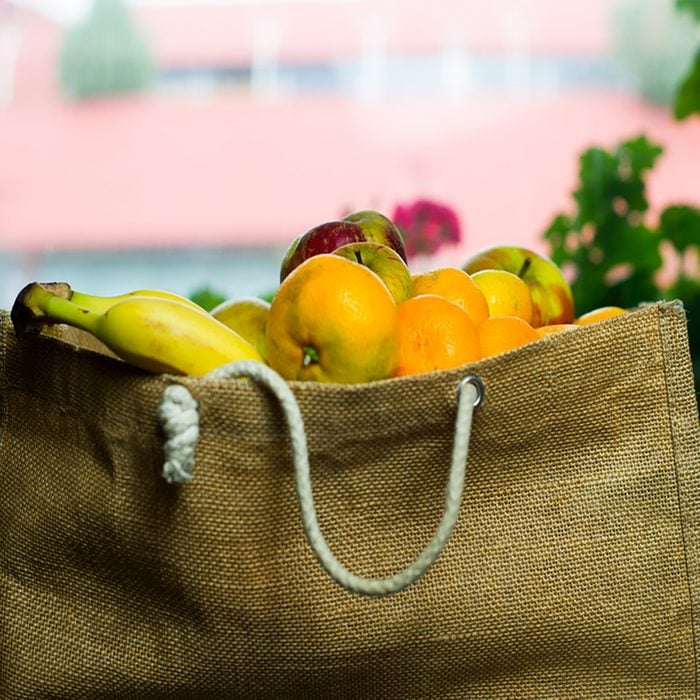 Grocery bag full of fruits