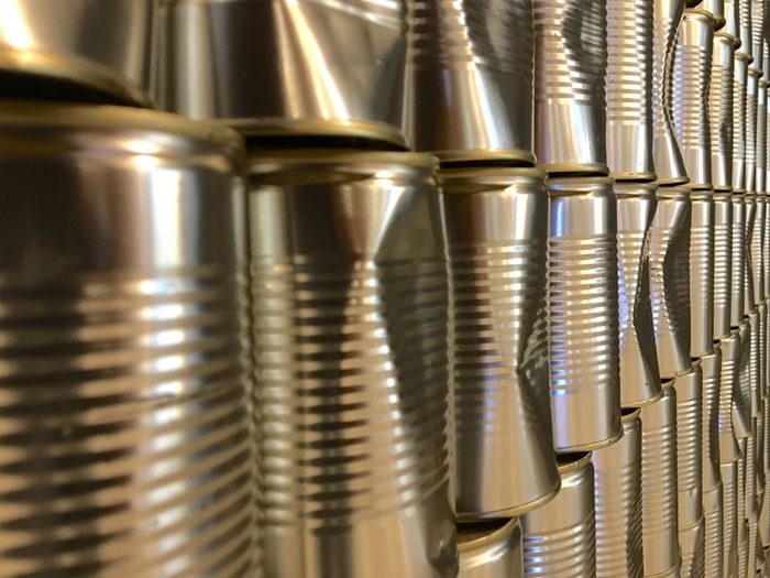 Rows of aluminium cans as backdrop of a food and beverages outlet