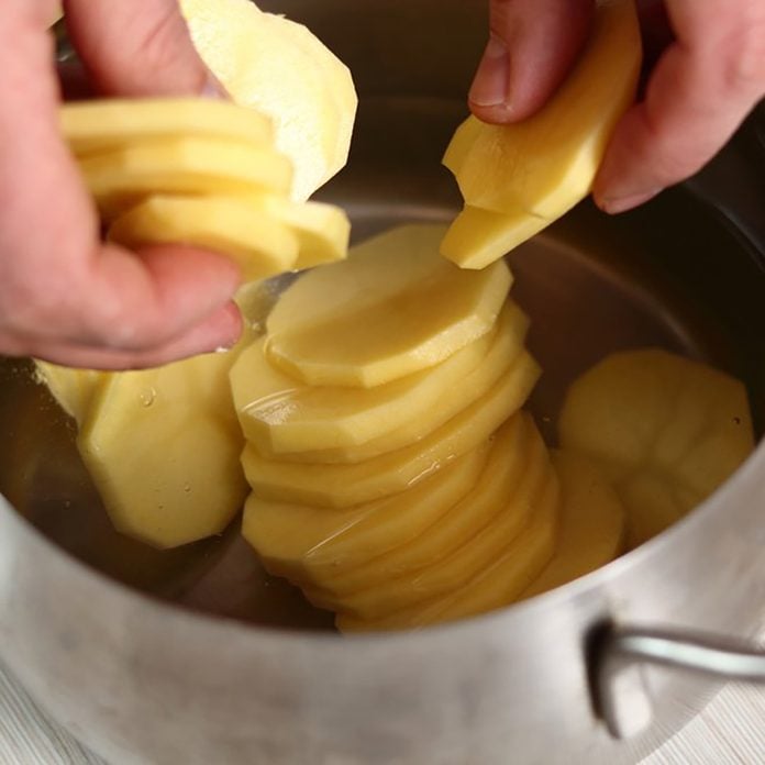 potatoes being soaked in water