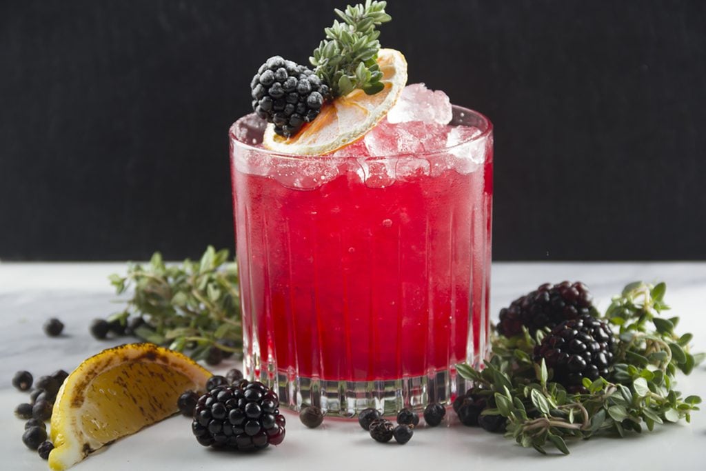 Thyme infused gin shaken with Creme de Mure, homemade blackberry & thyme shrub and blackberries