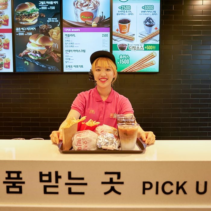 BUSAN, SOUTH KOREA - CIRCA MAY, 2017: worker at McDonald's. McDonald's is an American hamburger and fast food restaurant chain.; Shutterstock ID 692595700; Job (TFH, TOH, RD, BNB, CWM, CM): Taste of Home