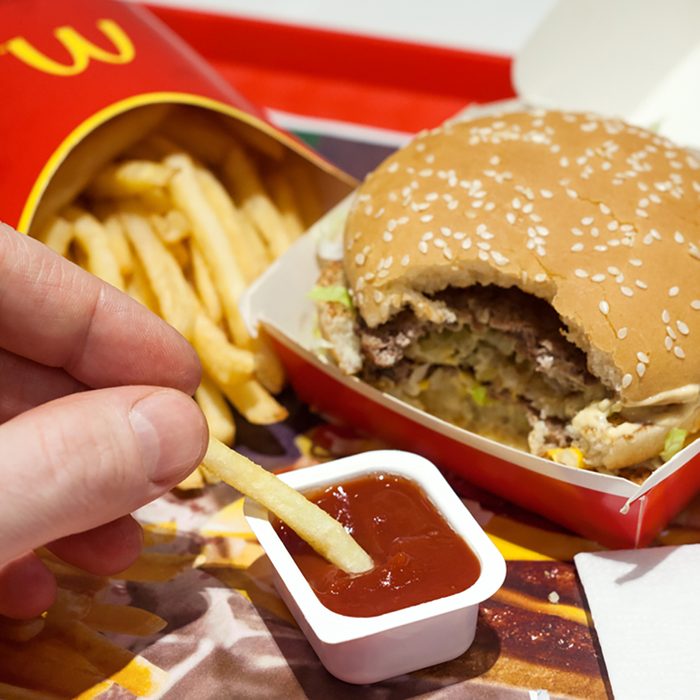 Minsk, Belarus, January 8, 2018: Man is eating at McDonald's restaurant. ; Shutterstock ID 790873426