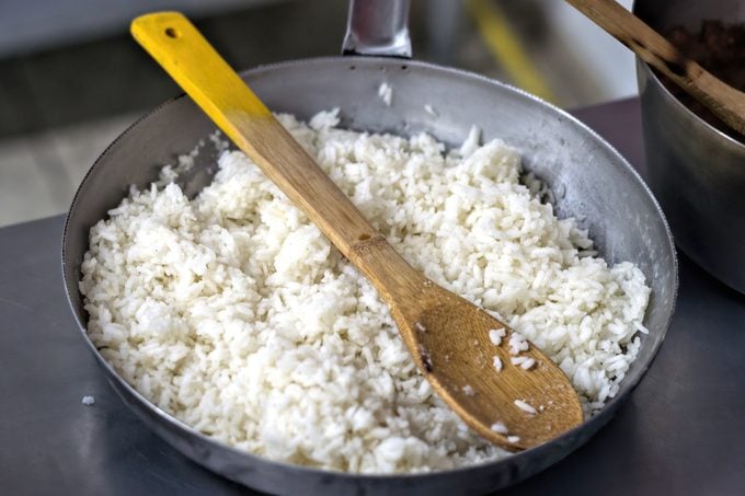 Homemade cooked white rice in a pan.