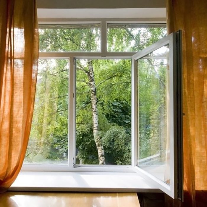 open windows with curtains