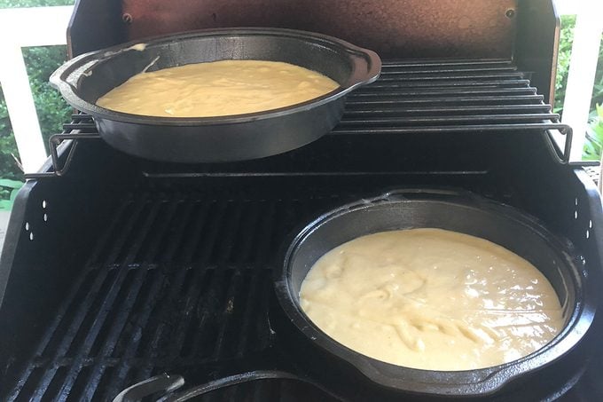 Cakes in pans on the grill