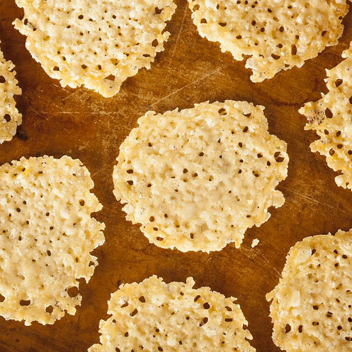 Homemade Baked Parmesan Cheese Crisp against a background