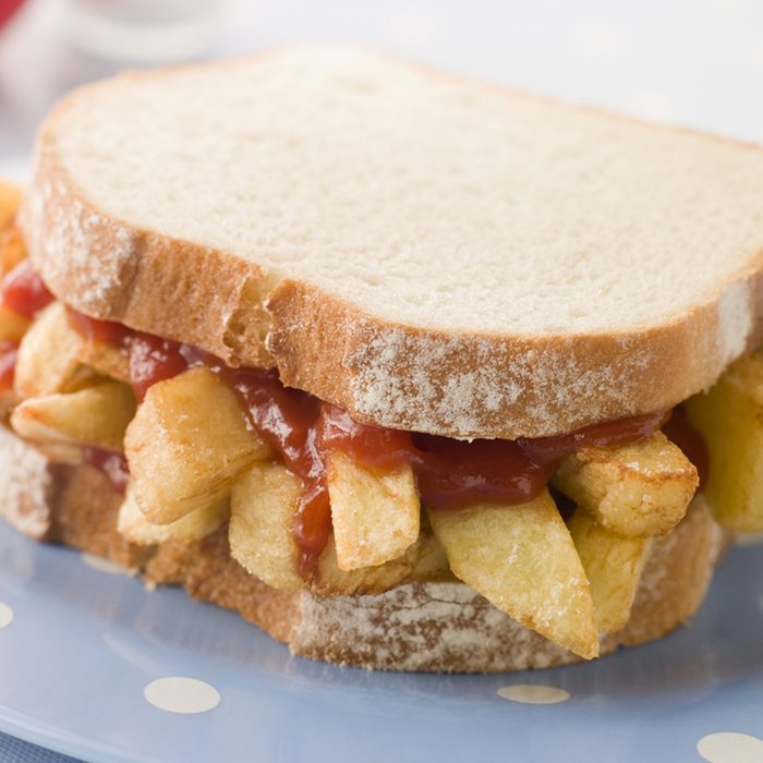 Chip Sandwich on White Bread with Tomato Ketchup