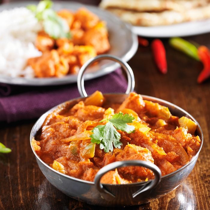 indian chicken vindaloo curry in balti dish close up