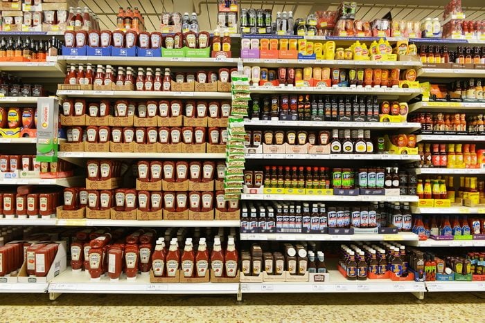 London, UK - December 12, 2014: Shelf view of a Tesco supermarket store. Britain's Tesco supermarket chain is the world's third largest retailer after America's Walmart and France's Carrefour.; Shutterstock ID 237256429