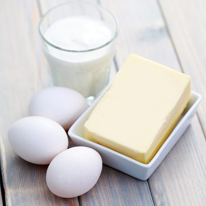 Dairy products on wooden table - food and drink