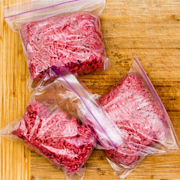 Fresh ground beef in resealable plastic bags ready to go into the freezer