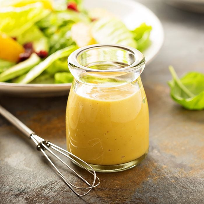 Homemade honey mustard salad dressing in a jar; Shutterstock ID 571647685; Job (TFH, TOH, RD, BNB, CWM, CM): Taste of Home