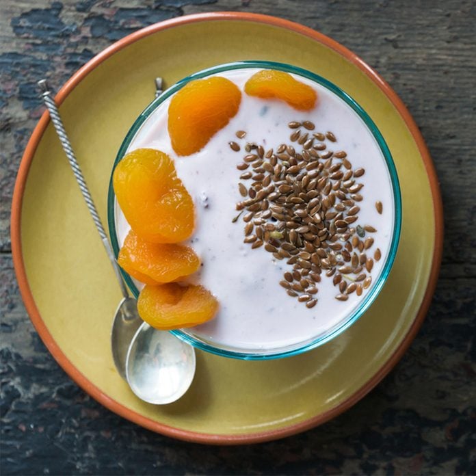 yogurt bowl with fruit and flaxseed