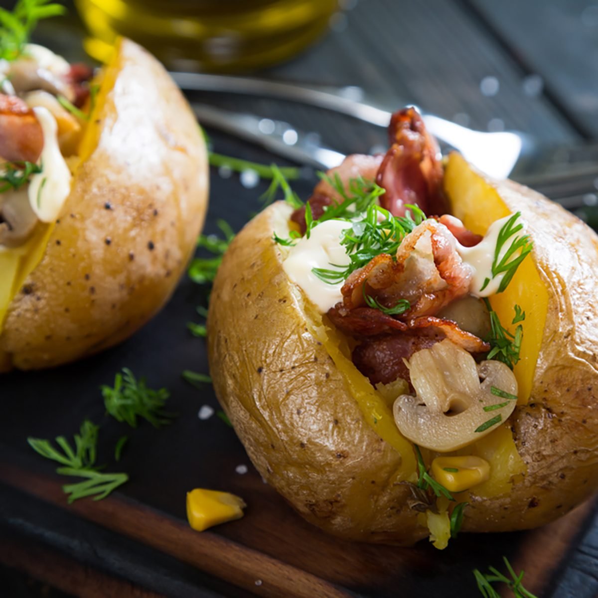 Baked potato with bacon cheese and mushrooms;
