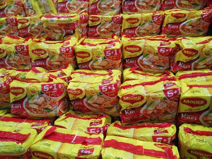 KUALA LUMPUR, MALAYSIA - 18 JUNE, 2017 : Maggi instant noodles. Owned by Nestle, Maggi is an international brand of soups, stocks, bouillon cubes, ketchup, sauces, seasonings and instant noodles.