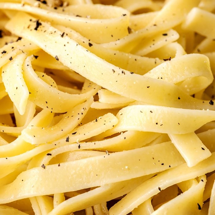 Closeup of cooked pasta textured background