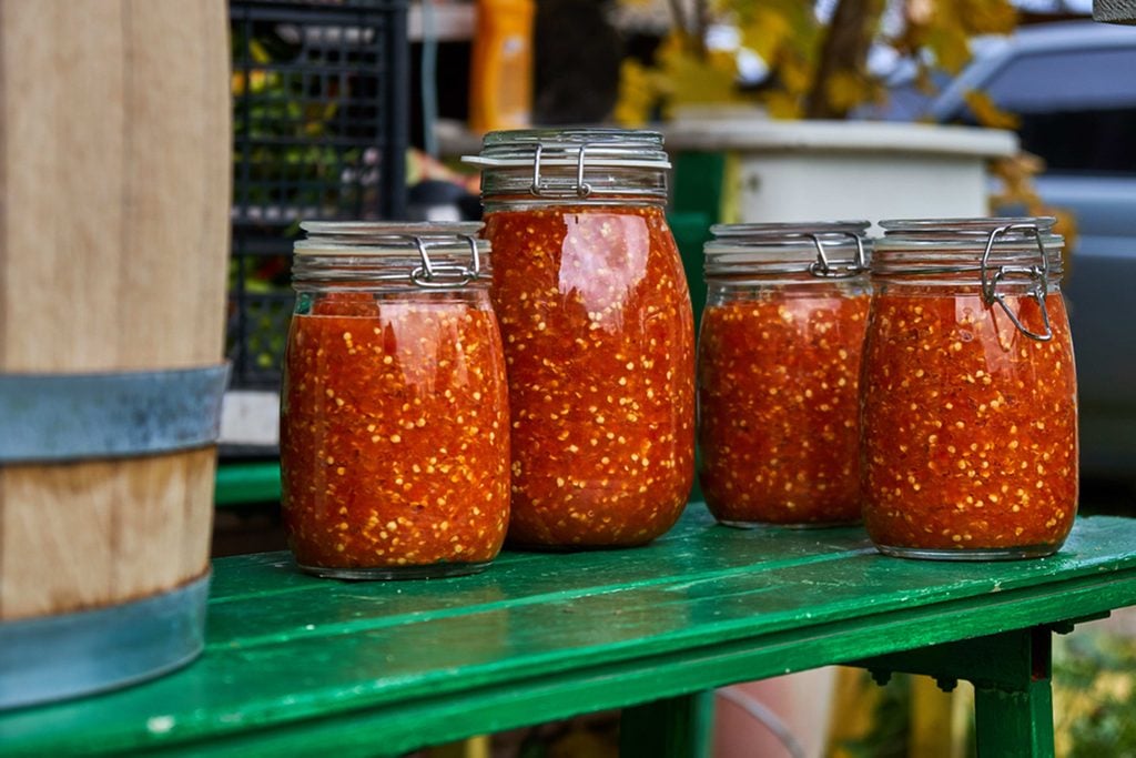 Grinded hot pepper in jars