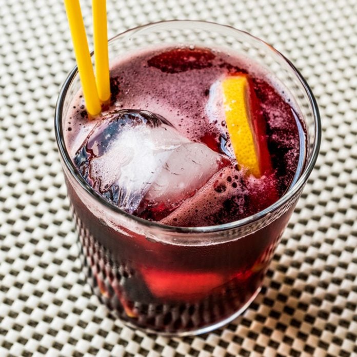 Americano Cocktail with lemon and ice.