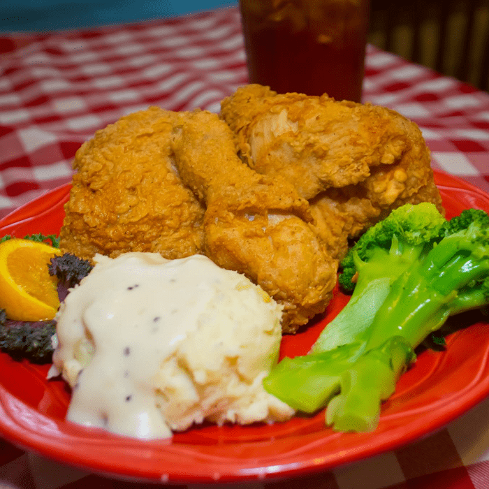 Myrtie Mae's fried chicken with mashed potatoes and greens