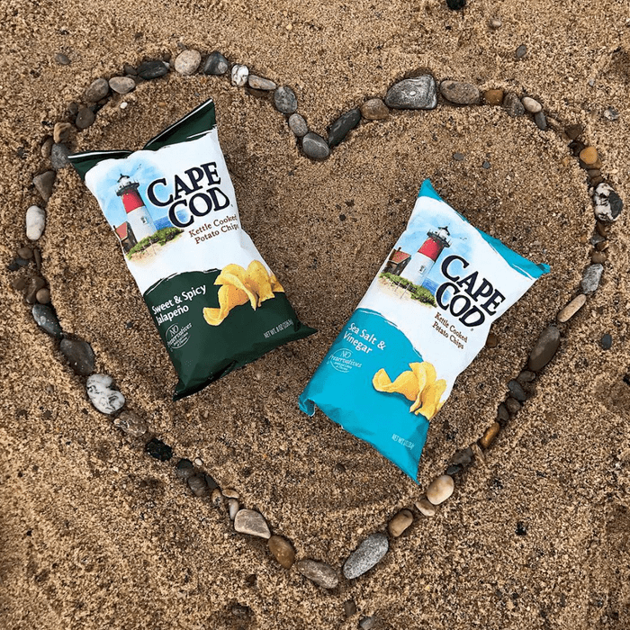 Cape Cod Chips on a beach inside a heart made of pebbles